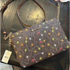 MK plane purse